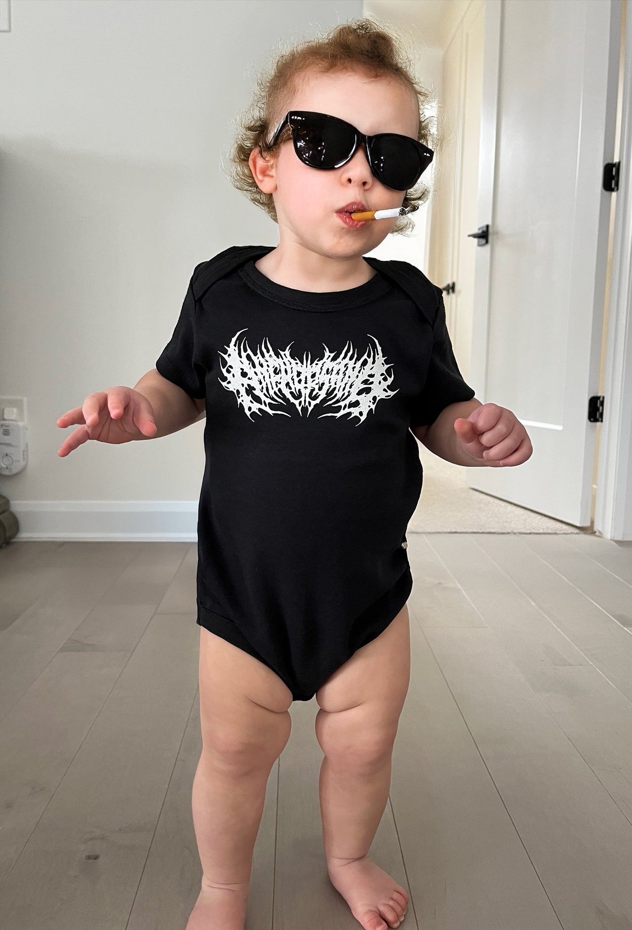 MASSACRE BABY ONESIE